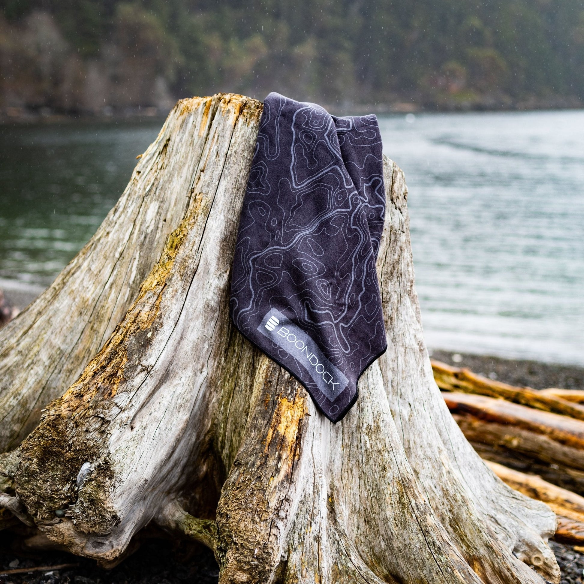 boondock overland microfiber quick dry beach towel outdoors black on stump